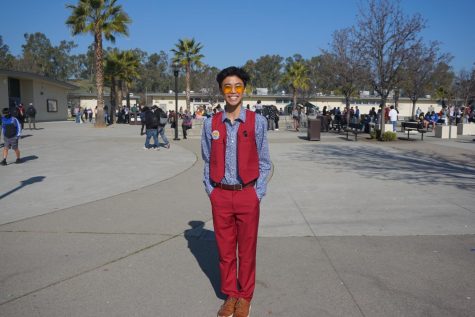 Aiden Clarin in the quad dressed up for spirit week on decades day. 