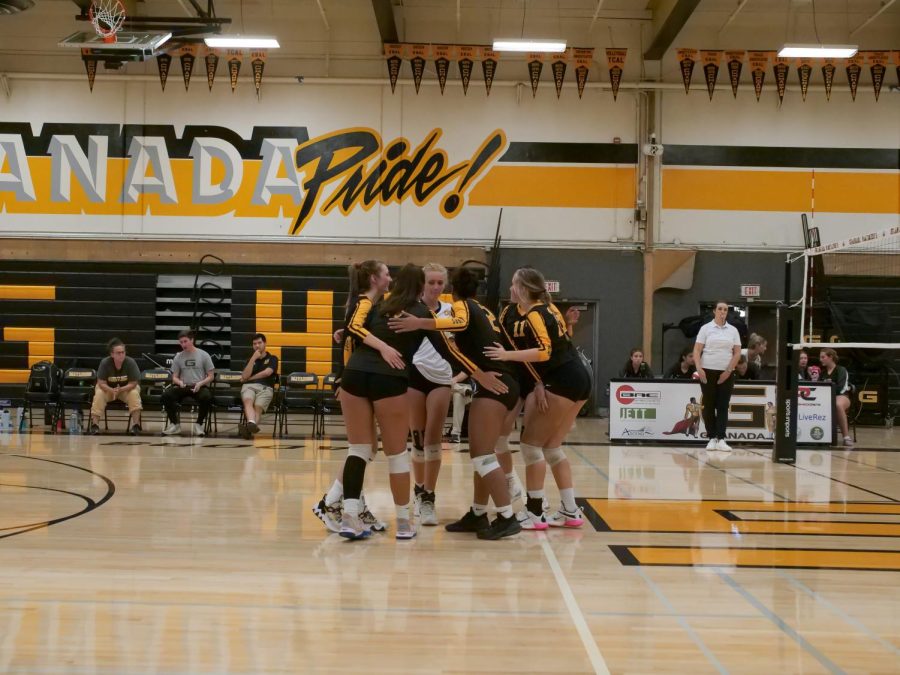 Girls+Volleyball+Team+in+a+Huddle%2C+Photo+taken+by+the+Livermore-Granada+Boosters