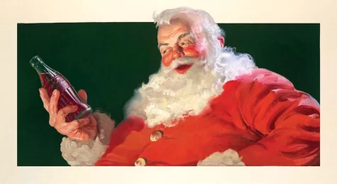Santa Claus holding a Coca-Cola