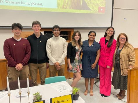 Pictured above is NHS Parliamentarian Giann Goulart, NHS Secretary Yoav Feigenbaum, NHS Treasurer Ruman Das, 
NHS Historian Amanda Dunmeyer, NHS President Sarah Suresh, NHS Vice President Najmah Rosha, and NHS Adviser Heidi McMichael
