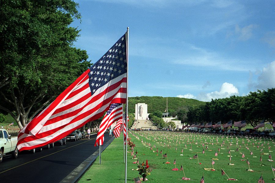 Flags line the driveway and adorn each grave at the National Memorial Cemetery of the Pacific, also known as the Punchbowl, in observance of Memorial Day.