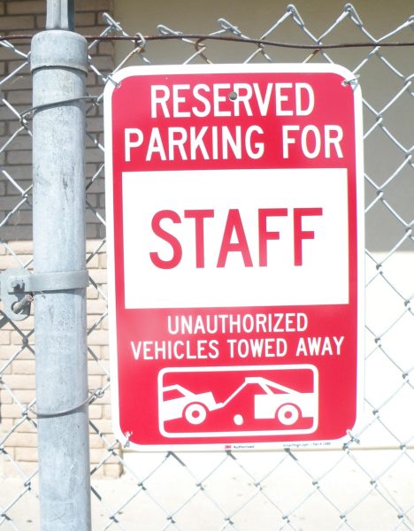Reserved parking sign located outside of the 500 hall.