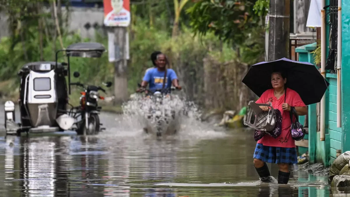 Flood hitting a filipino town, incomplete flood prevention projects have left many areas at risk. 