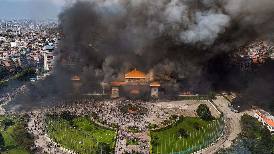 An aerial view of the Federal Parliament of Nepal burning, set on fire by the anti-government protesters   