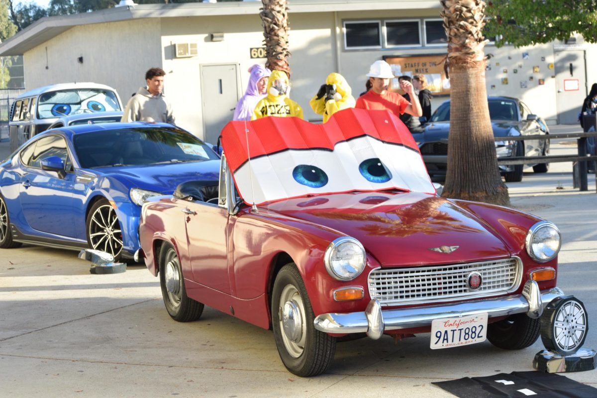Cars on the school ground set up for the movie "Cars."