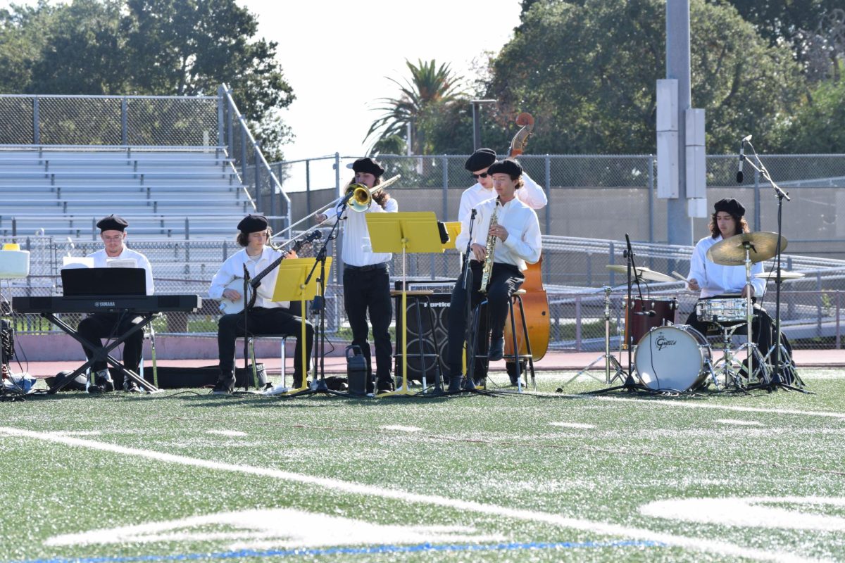 Band playing music from Pixar movies throughout the skit.