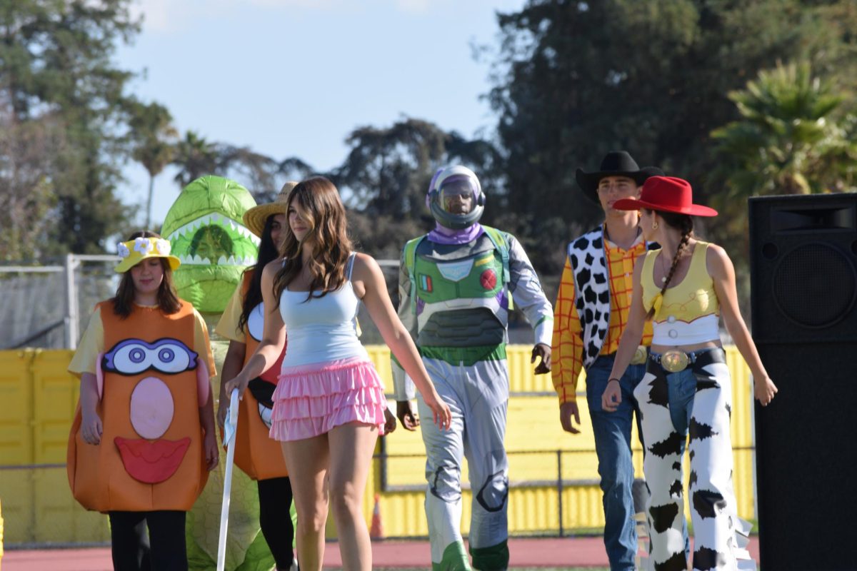 Toy Story cast appears.