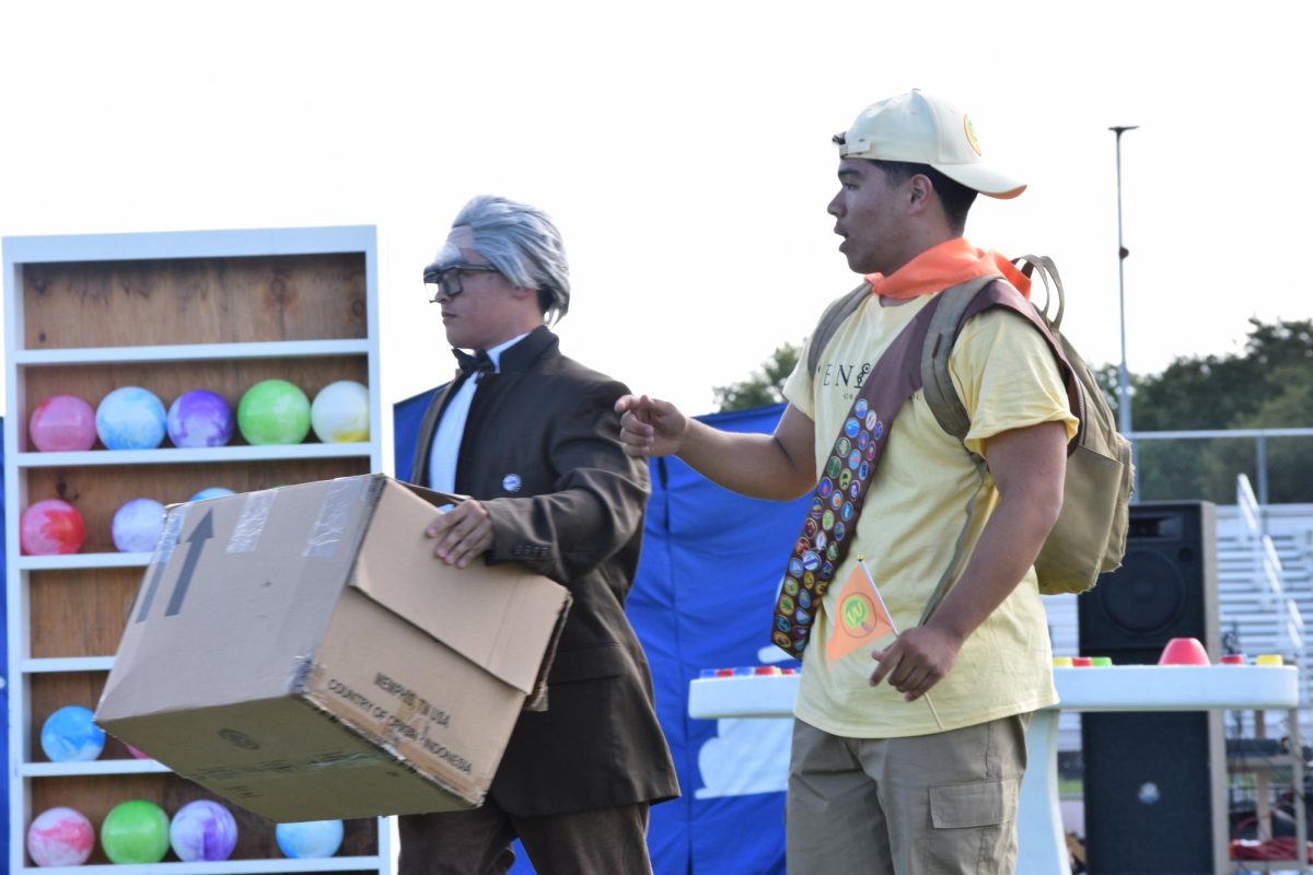 Carl Fredricksen grabbing a box for the emotions to look through.