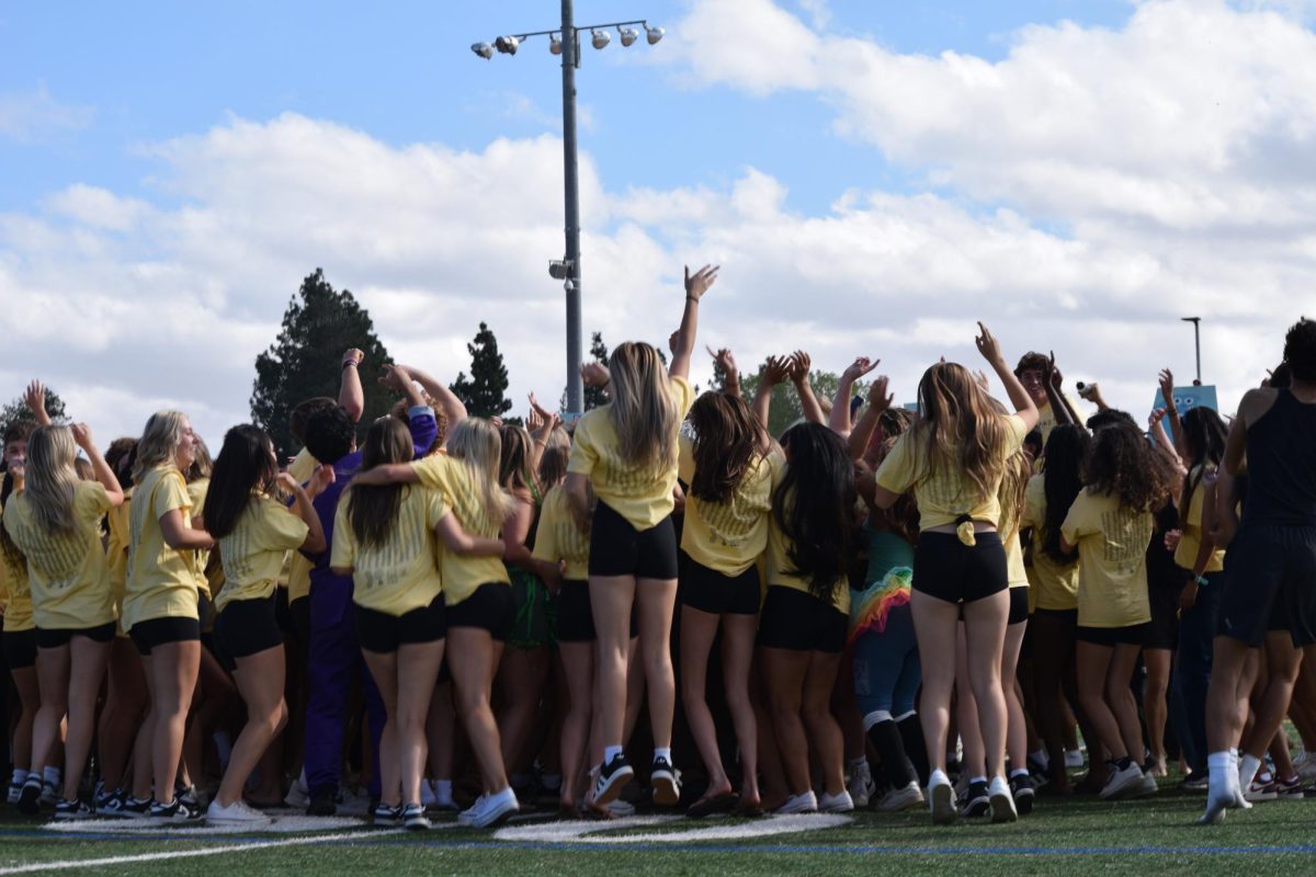 Seniors ending their skit with a crowd celebration. 